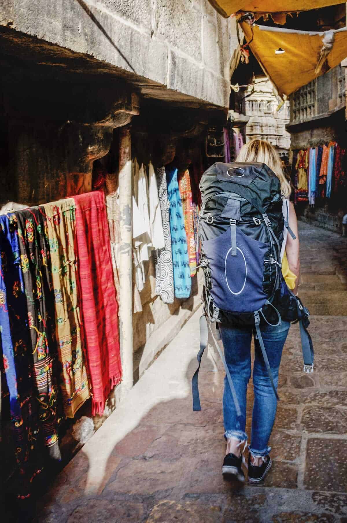 Western backpacker woman exploring India