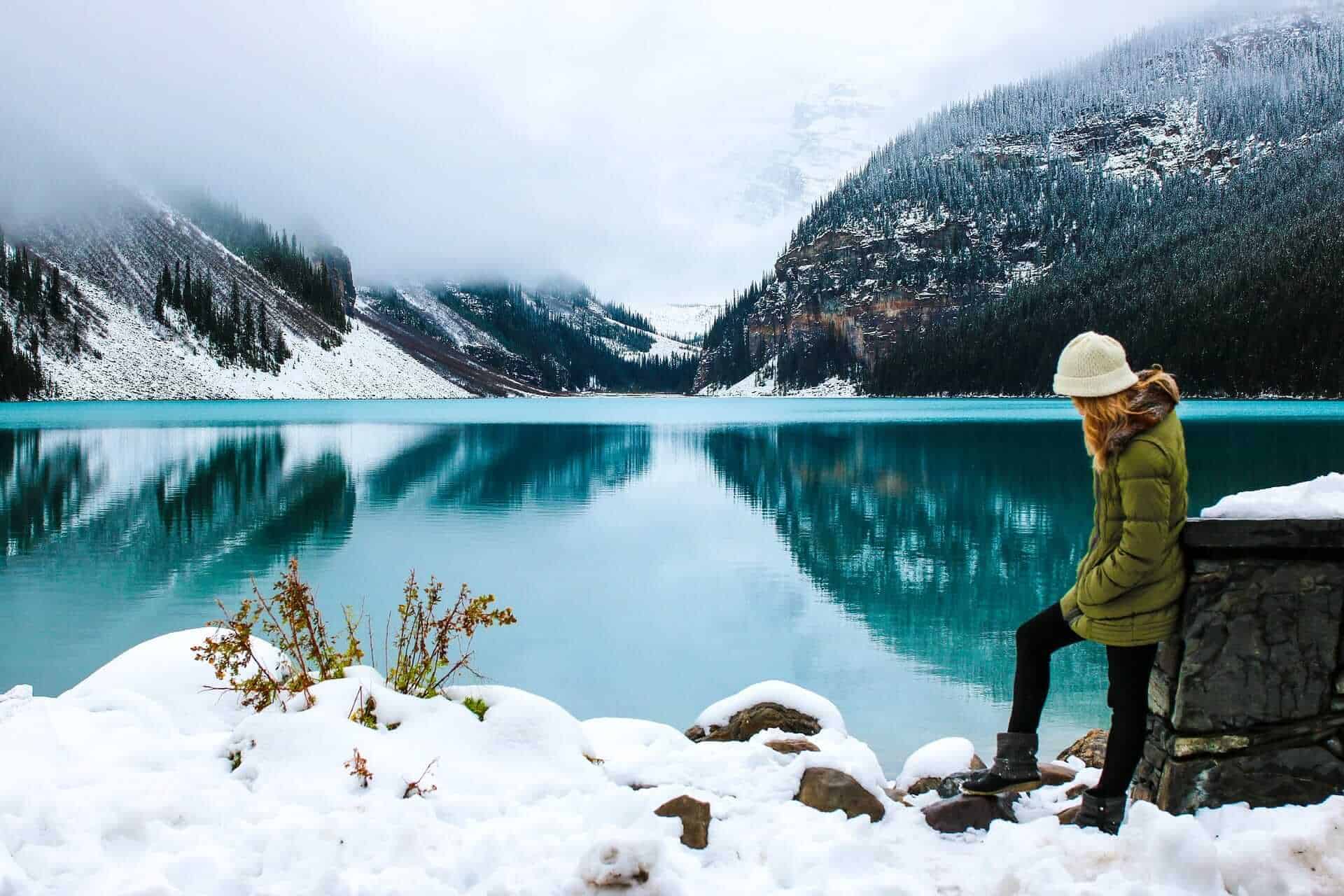 Woman traveling near lake